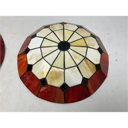 Three Tiffany style leaded ceiling light shades, comprising pair with cream and red panels and further mosaic style cream example, largest D37cm