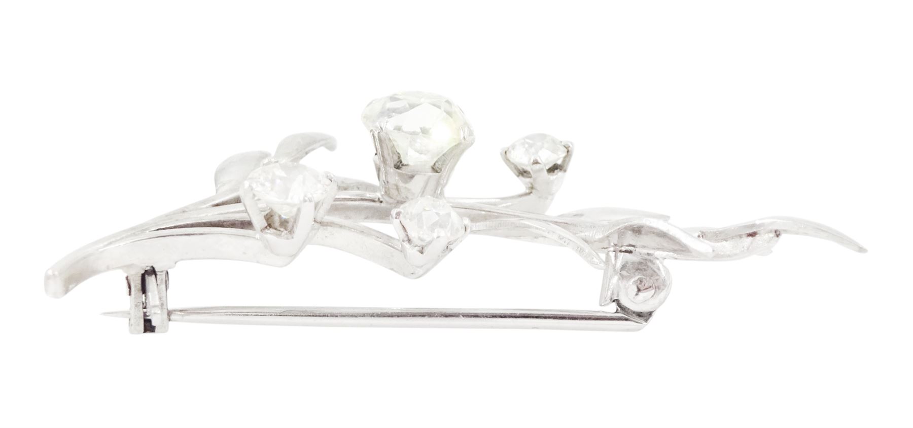 18ct white gold diamond flower brooch, set with a principal old cut diamond of approx 1.00 carat, surrounded by three further old cut diamonds, total diamond weight approx 1.75 carat