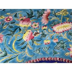 18th/19th century Chinese Canton enamel basin, the circular basin with flat everted rim, decorated with scrolling foliate and fruit decoration on a blue ground, D43cm