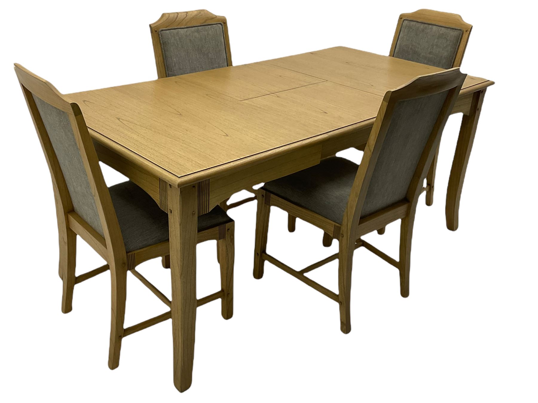 Windsor by Mark Devany oak rectangular extending dining table, with butterfly leaf, and four chairs with upholstered seats and backs