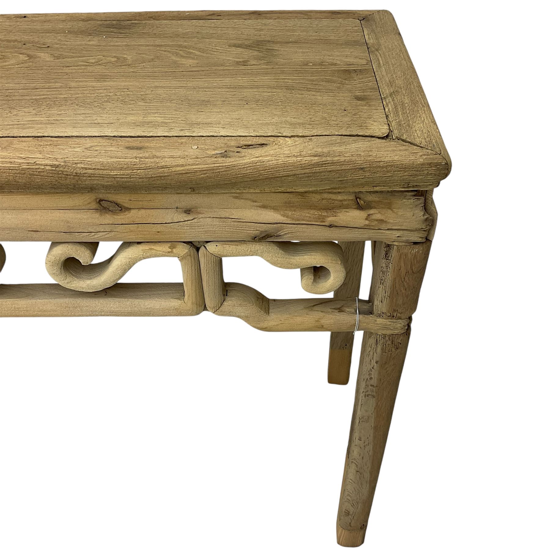 Chinese Ming design elm side table, rectangular top over shaped frieze rails, on square supports with curved outer edge 