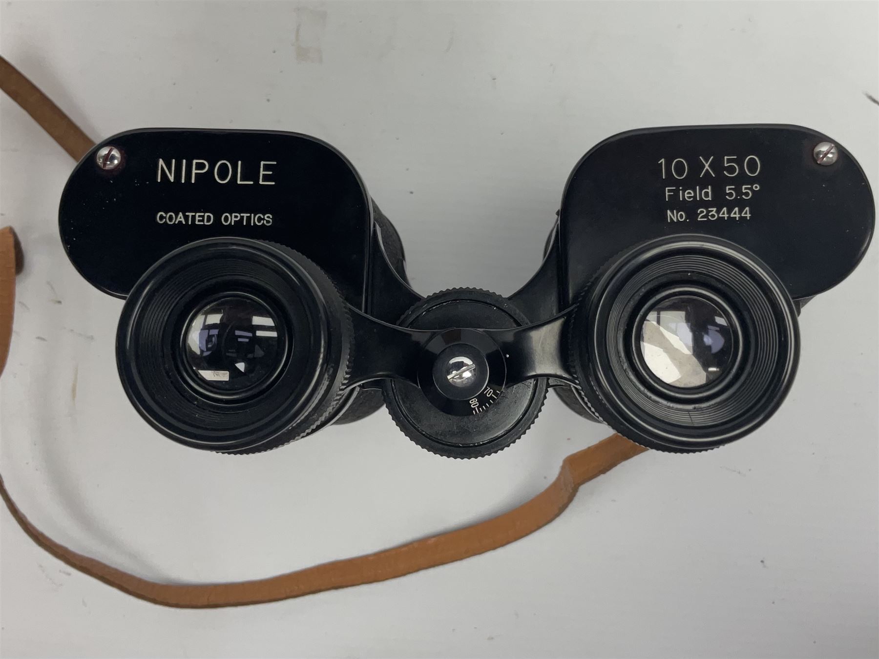 Pair of British World War Two issue black-painted binoculars, Bino 7x50 No. 5, 6E/320, No. 87412, MoD.B/42, with case, together with Nipole 10 x 50 binoculars and two other pairs