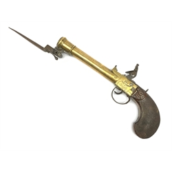 Early 19th century Belgian brass cannon barrelled flintlock overcoat pistol with 12cm spring bayonet, Liege (ELG) proof marks, foliate engraved boxlock action with sliding top safety, fluted and chequered walnut grip with stylised shell side plates, L40cm overall extended