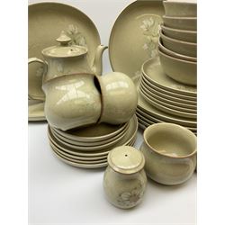 Denby tea and dinner ware decorated in the Daybreak pattern, comprising of tea pot, two jugs, seven cups and six saucers, salt and pepper shakers, four oval platters, six side plates, starter plates, dinner plates and bowls.