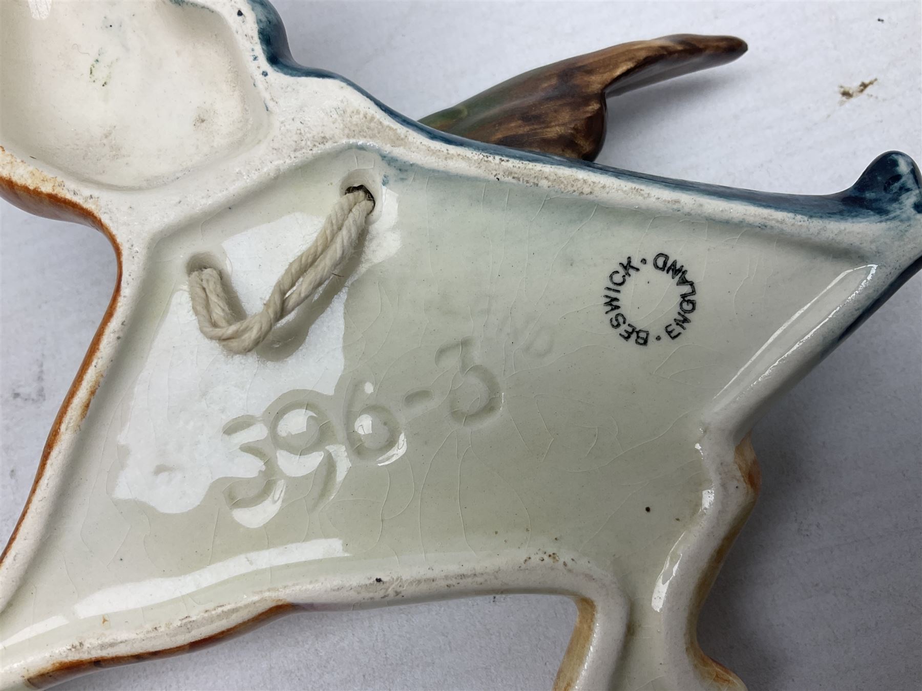 Set of five Beswick graduated wall mounting figures of flying ducks, models from 596/0 to 596/4, largest L29cm