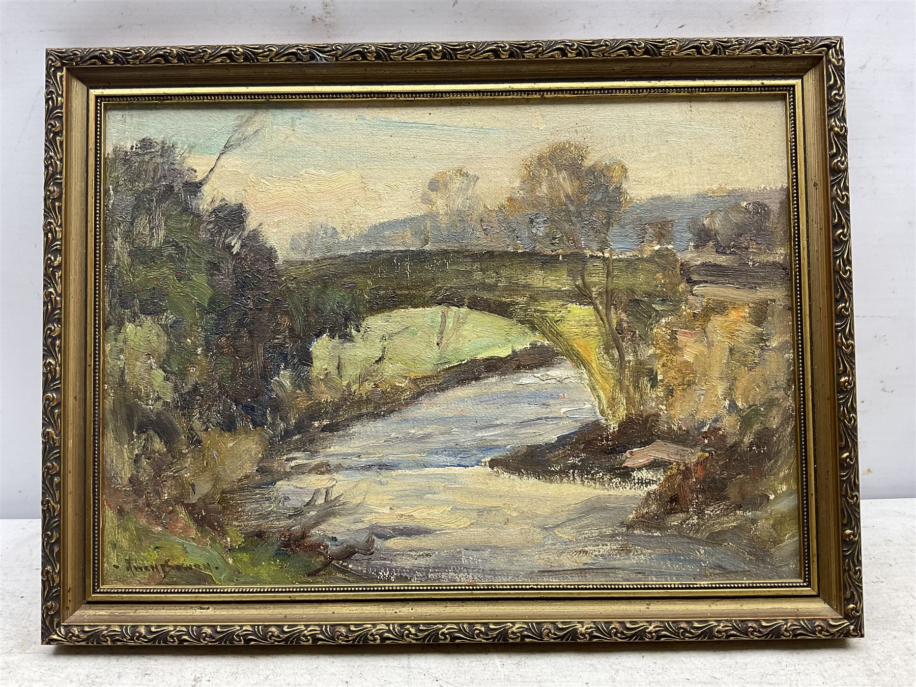 Owen Bowen (Staithes Group 1873-1967): A Stone Bridge at Dusk, oil on canvas laid on board signed 24cm x 34cm