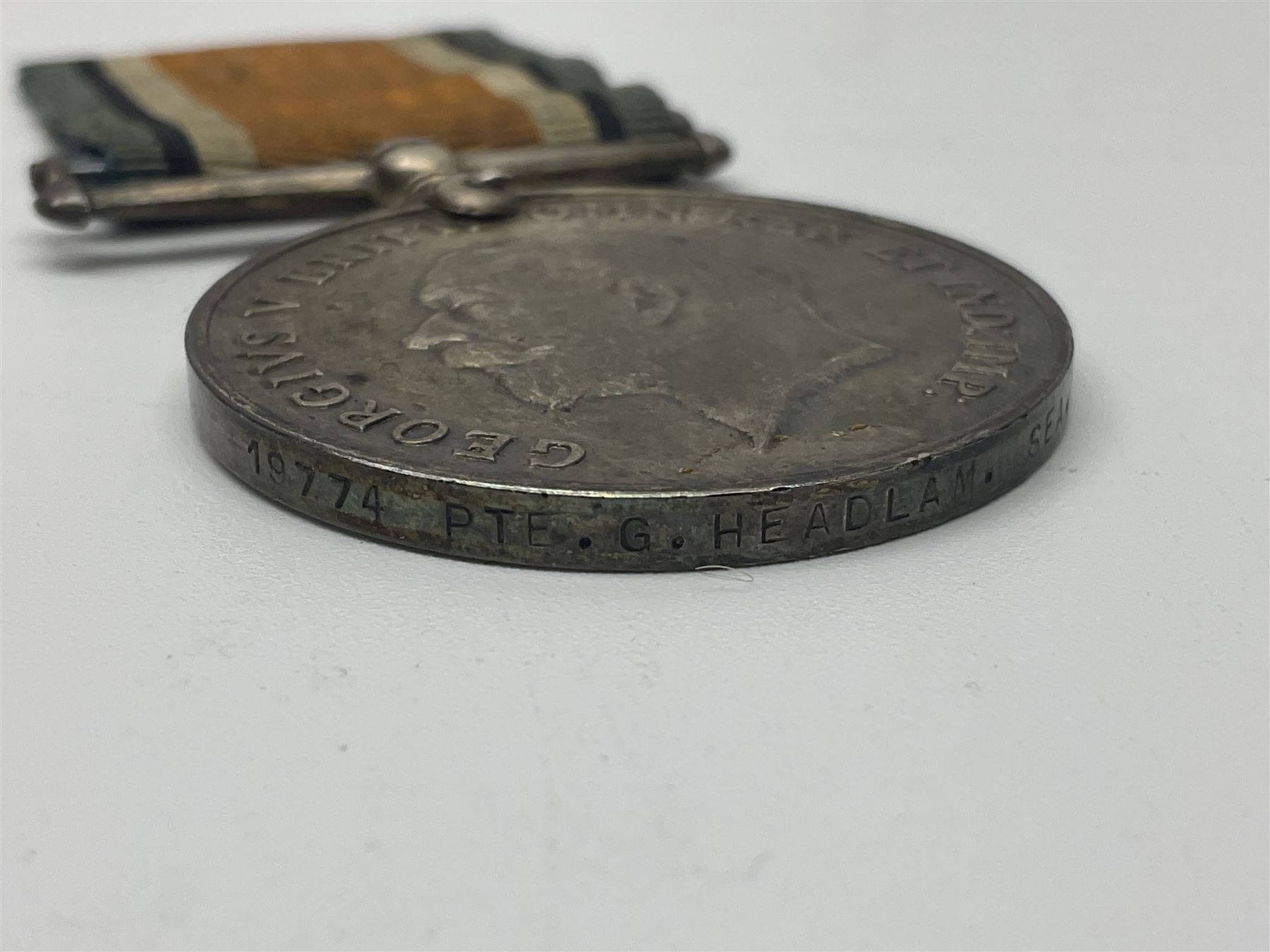WW1 pair of medals comprising British war medal and Victory Medal awarded to 19774 Pte. G. Headlam Sea. Highrs.; another WW1 pair of medals comprising British War Medal and Mercantile Marine Medal awarded to Charles Filburn; WW2 group of five medals comprising 1939-45 War Medal, Defence Medal, 1939-45 Star, Africa Star and Burma Star; in issue box addressed to Mr. H, Smithson with medal slip; all with ribbons; and Edward VIII Coronation medal (10)