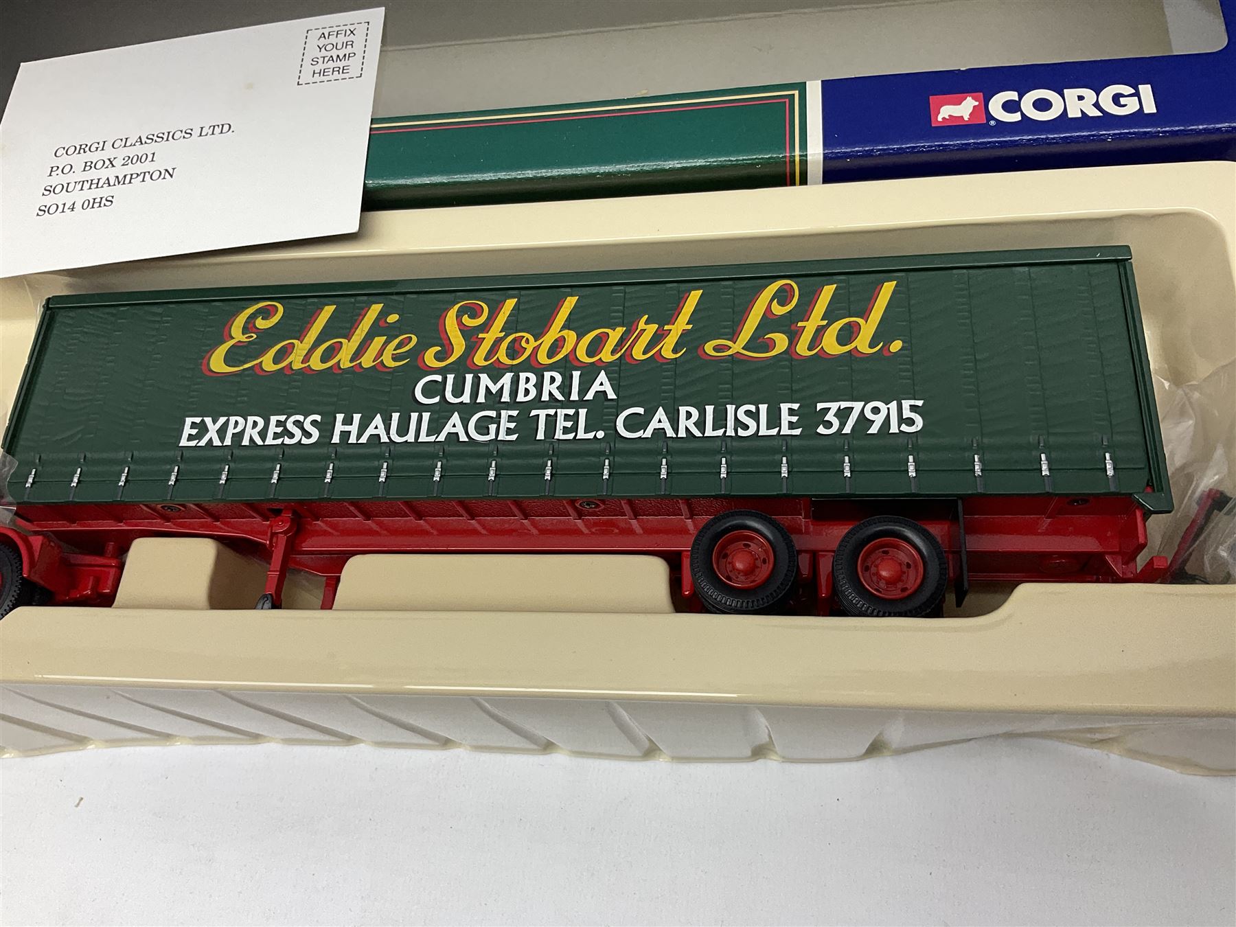 Corgi Eddie Stobart - three limited edition lorries; two Hauliers of Renown - CC13415 MAN TGA XXL Curtainside and CC14002 Volvo FH Curtainside; and  CC12607 Scammell Crusader Tautliner; all boxed (3)