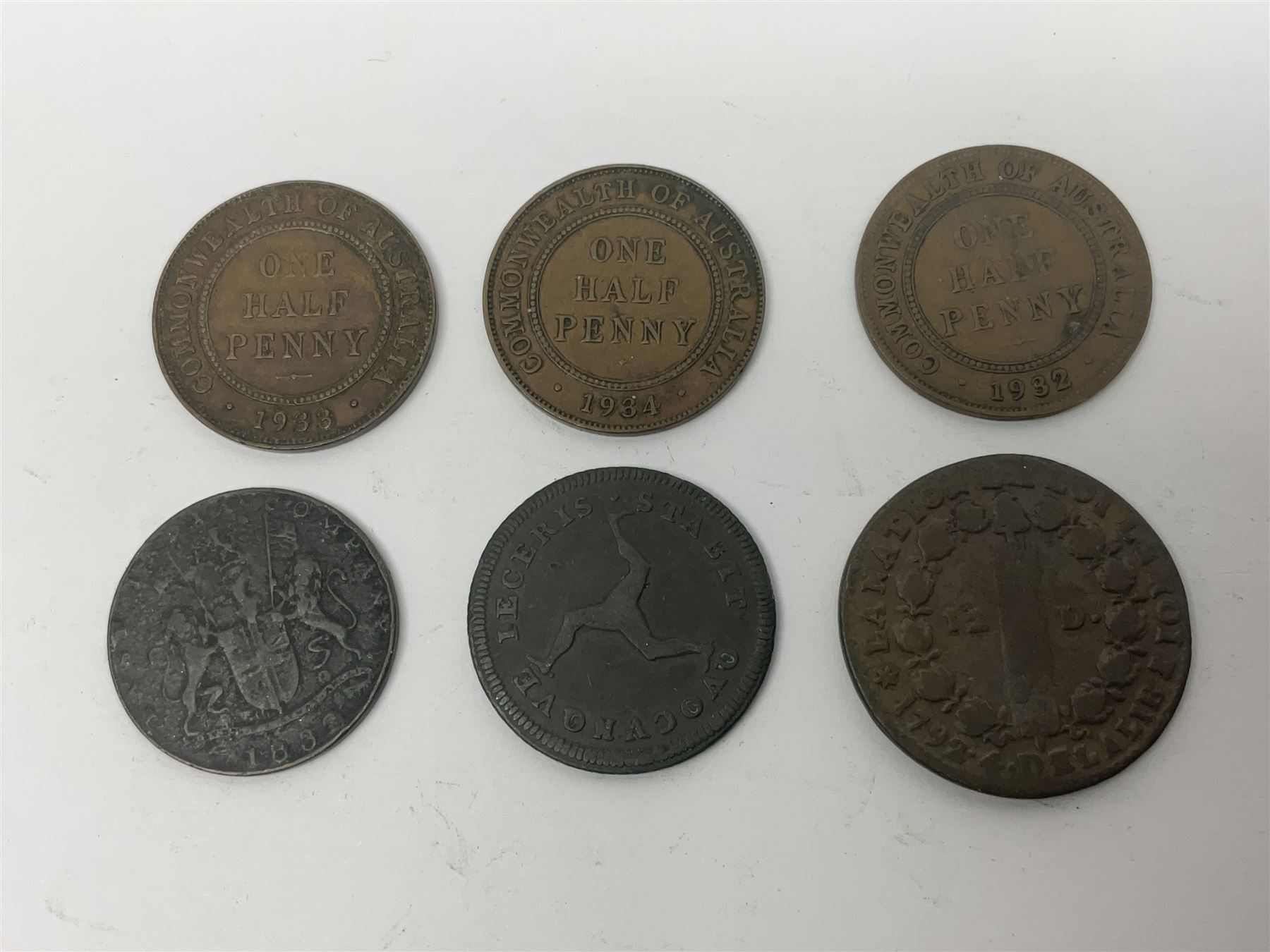 Thirty six late 18th century and onwards United Kingdom and World coins and tokens, to include 1772 Catherine II 5 Kopecks, Swedish quarter and half Skilling pieces dated 1809 and 1806, two Skilling Courant piece dated 1810, 1831 Isle of Man half penny token etc 