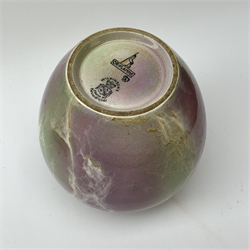 An A J Wilkinson Oriflamme vase designed by John Butler, of ovoid form with lustre marbled decoration, with marks beneath and artists monogram for John Butler, H15cm. 