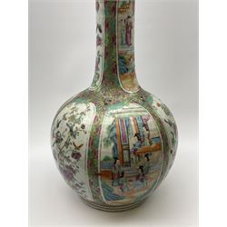 A 19th century Chinese Canton Famille Rose vase, of globular form with tall neck, and cover with finial, decorated with alternating panels of figural scenes, and birds and butterflies amongst blossoming and fruiting trees, with foliate surround against gilt, overall H57cm. 