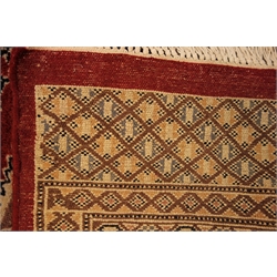  Persian Bokhara design hand knotted red ground rug, stepped lozenge, W320cm, L420cm  