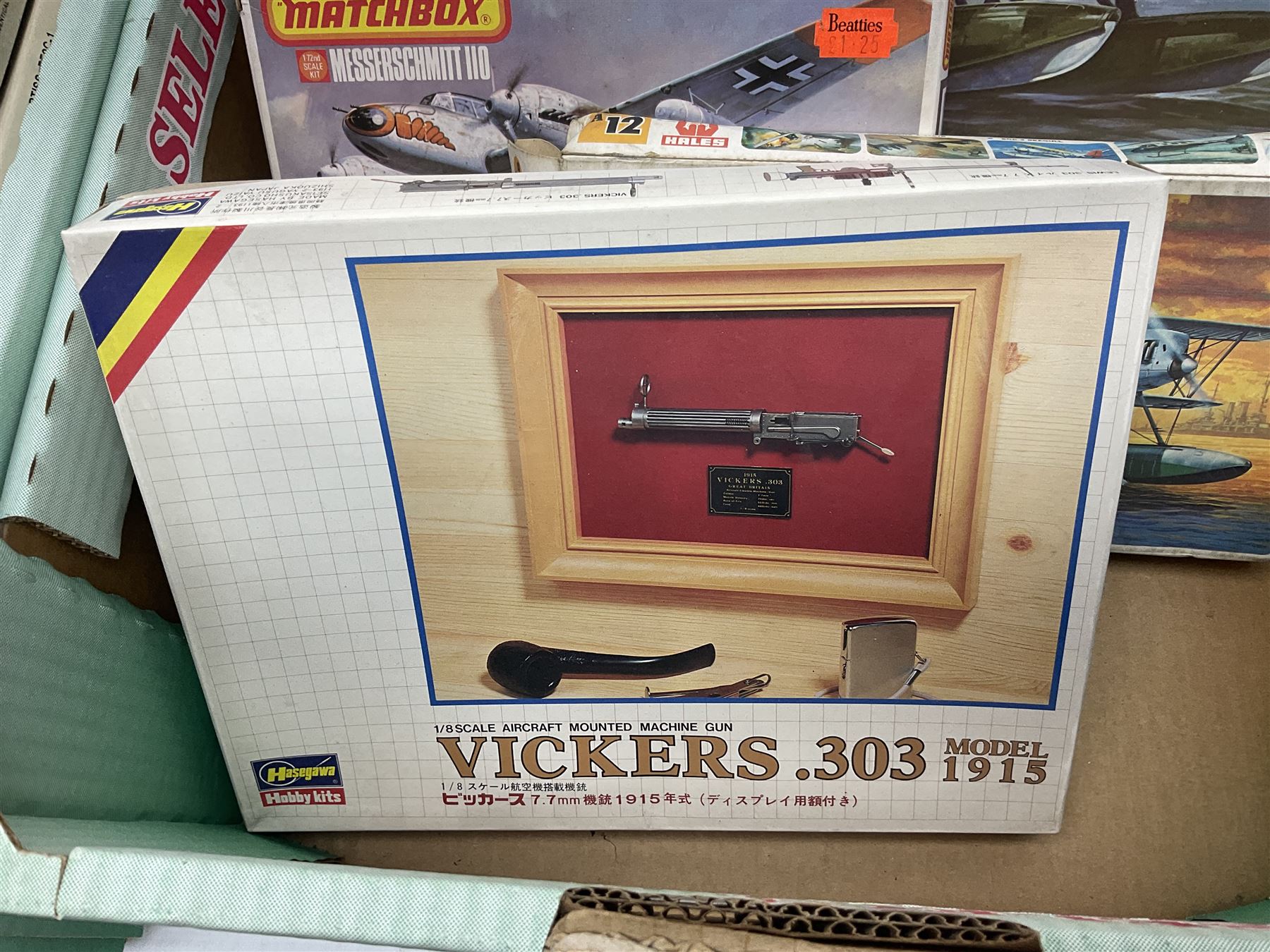 Twelve scale model kits, comprising ten model aircraft kits from Hasegawa, Nichimo, Fujimi and Matchbox, and two further Hasegawa 1:8 scale aircraft mounted machine gun kits, in two boxes 
