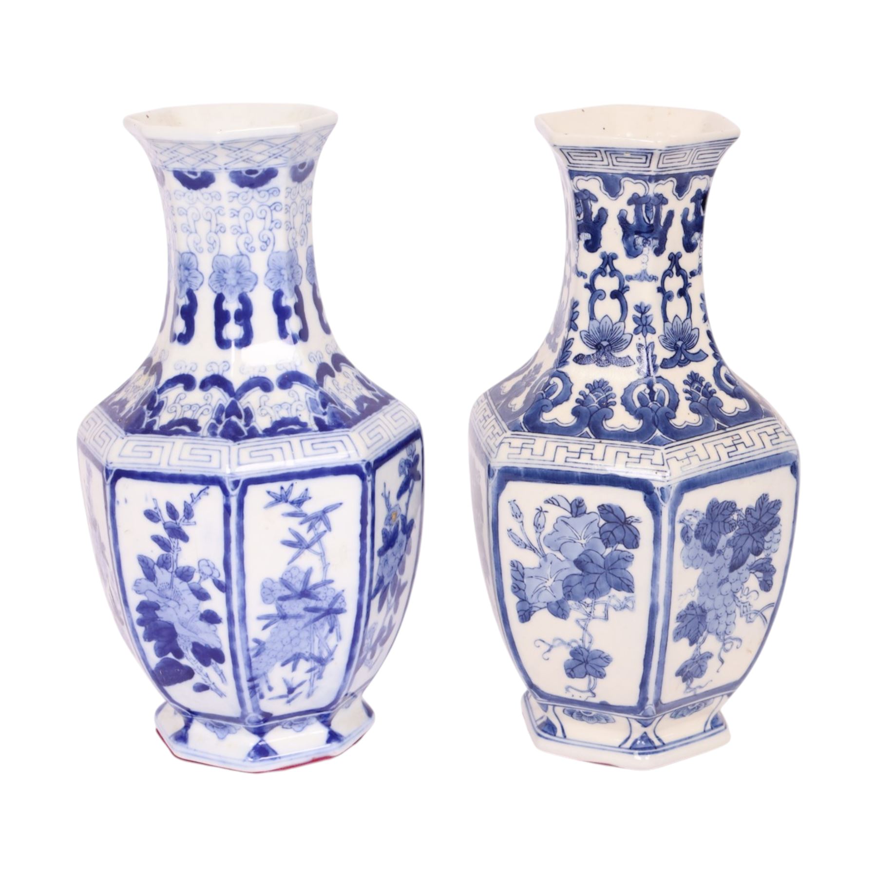 Pair of blue and white vases, of octagonal form, decorated with panels of blossoming branches, H36cm