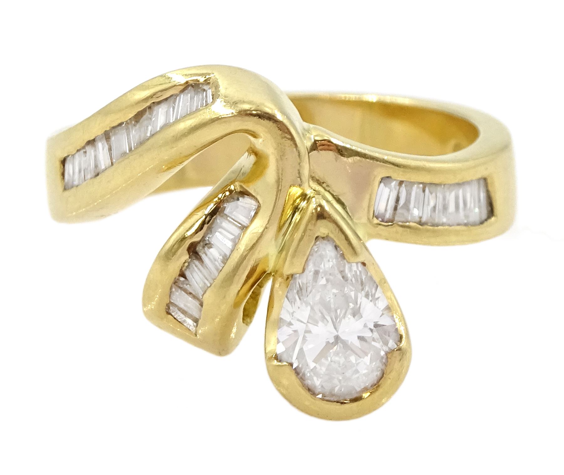 18ct gold diamond pear and baguette cut diamond ring, stamped 750, principle pear cut diamond of approx 0.75 carat, total diamond weight approx 1.25 carat