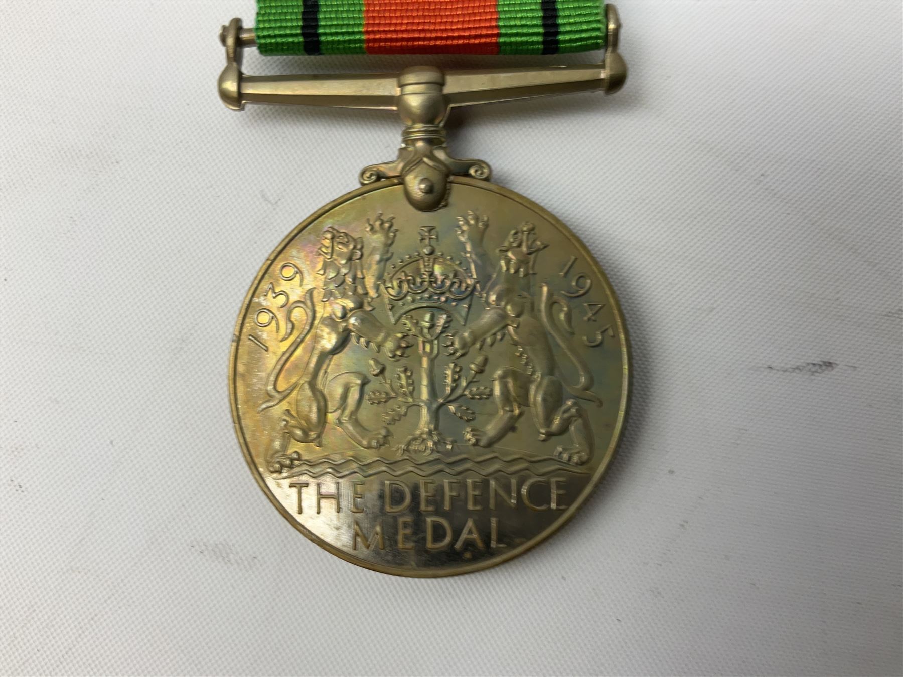 WW1 group of three medals comprising British War Medal and Victory Medal in issue box and Ceylon Volunteer Service Medal awarded to 10288 Pte. M. Smith R. Fus.; together with a later awarded WW2 Defence Medal in modern box with slip; and his QEII Imperial Service Medal in case and box with certificate dated 1959