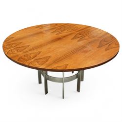 Mid-century Merrow Associates rosewood and chrome dining table, the circular top with striking rosewood veneers, raised on a chromed steel base of eight supports joined by a central ring stretcher