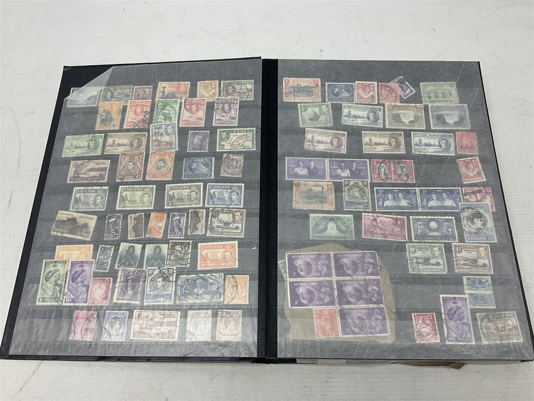 Stamps including St Helena, Fiji, Southern Rhodesia, Malaya, Bermuda, Queen Victoria and later Ceylon, various Universal Postal Union 1949 etc, housed in six albums/folders