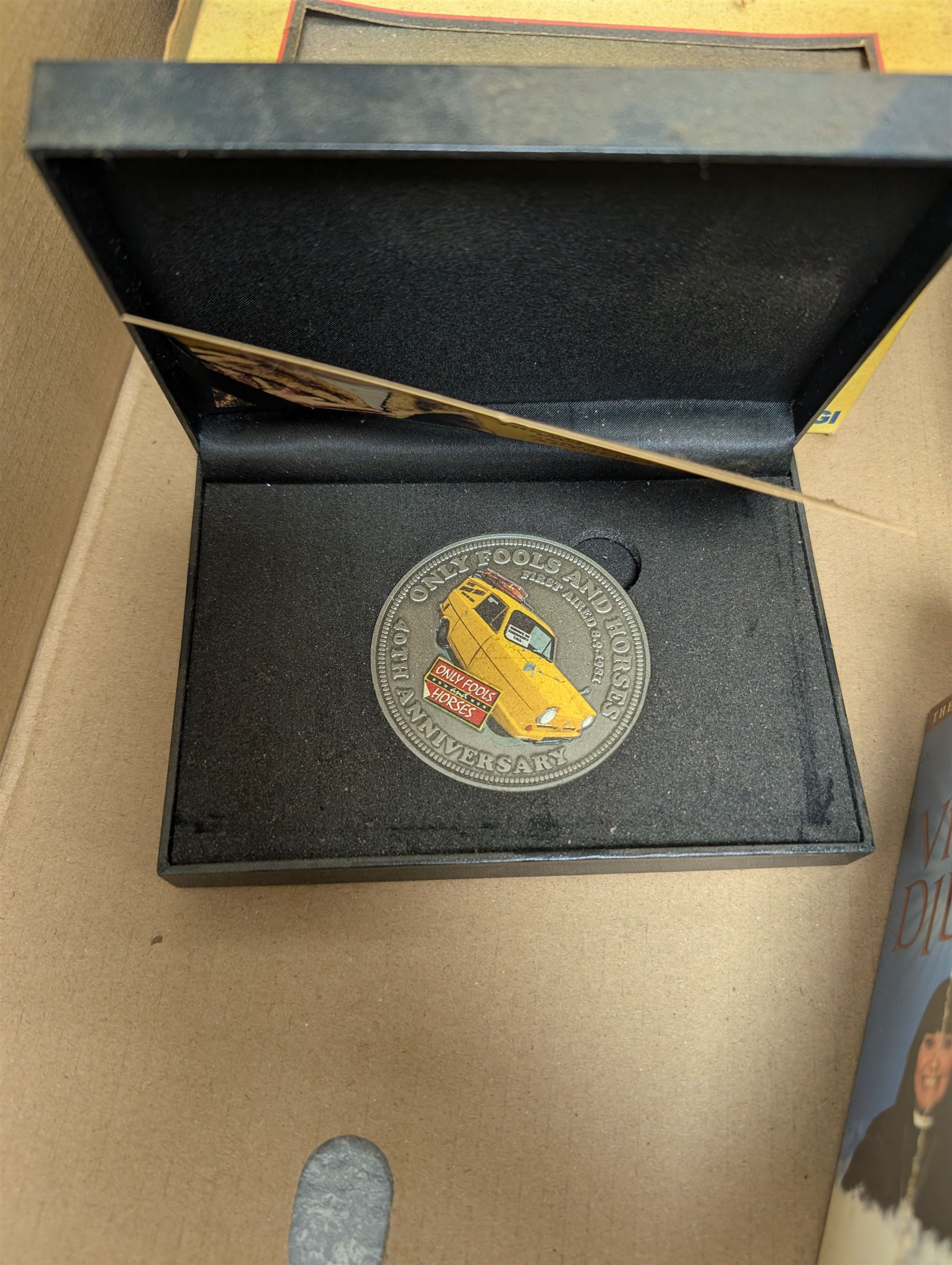 Collection of Only Fools and Horses memorabilia, including Westminster Mint limited edition fifty pence coin set, DVD box set, Corgi Reliant Regal, playing cards, framed bank notes, Griffin Cartoon of the bar scene, etc, together with a Vicar of Dibley DVD box set