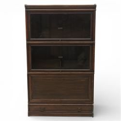 Globe Wernicke - early 20th century three sectional stacking library bookcase, two glazed sections above a panelled section, on a plinth base with inbuilt drawer