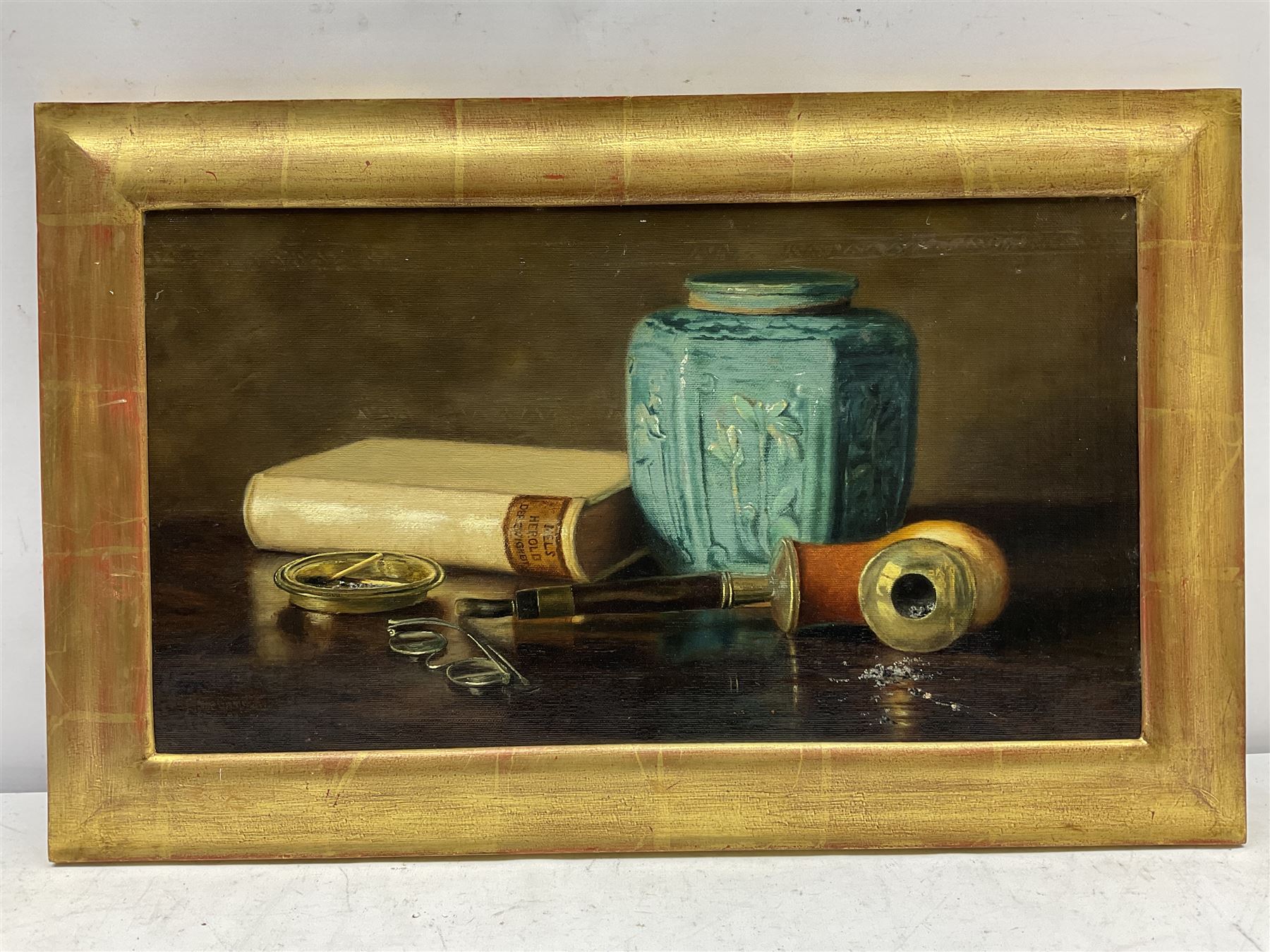 Elaine Katherine Grimshaw (British 1877-1972): Still Life of a Chinese Jar Pipe Book and Spectacles, oil on canvas signed and dated '97, 25cm x 45cm
Notes: Elaine daughter of John Atkinson Grimshaw married E. Ragland Phillips at the age of twenty in 1897. Elaine studied at Balliol College Oxford and whilst there she attended the Ruskin School of Art Oxford. After her marriage, she signed her work, Elaine K Phillips or Elaine Phillips or E Ragland Phillips