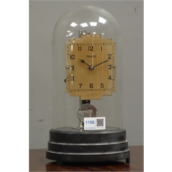  'Tempex' Art Deco period electric magnetic clock, stepped rectangular silvered dial, on circular black bakelite plinth, H30cm  