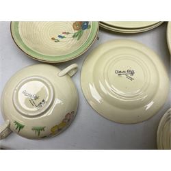 Clarice Cliff for Newport Pottery Corolla pattern tea and dinner wares, comprising triangular bowl, four side plates, two shallow bowls and teacup (a/f), together with a Clarice Cliff Wilkinson twin handled soup bowl and unassociated saucer both decorated with pink and yellow flowers, together with other mid century ceramics comprising Parrott and Company Coronet Ware, and Royal Staffordshire AJ. Wilkinson Ltd dinner wares