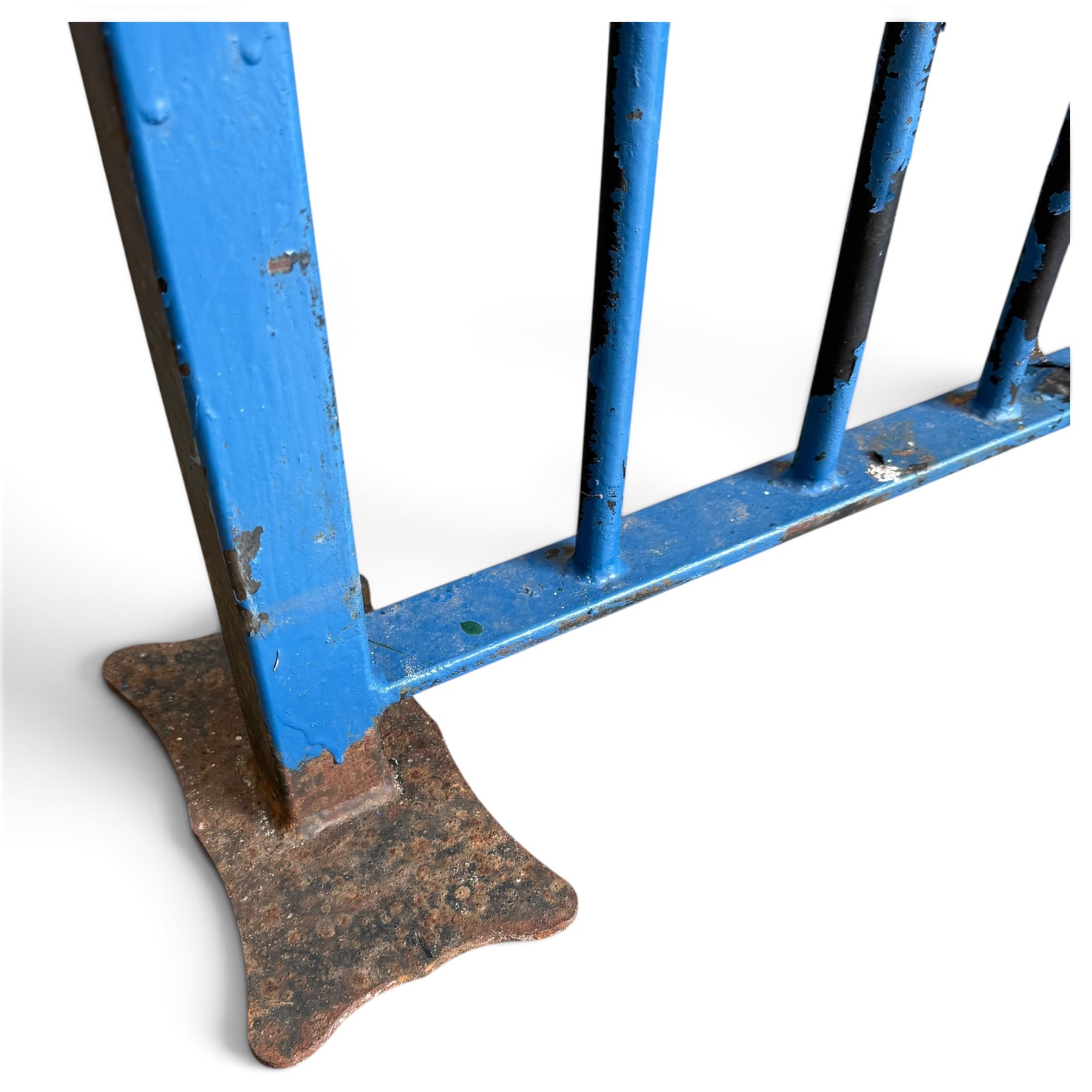 Two sections of painted iron garden or estate boundary railing, comprising a 19th century wrought iron section with graduated spearhead uprights, together with a later hoop-top section with ball-finial end posts, both in blue painted finish