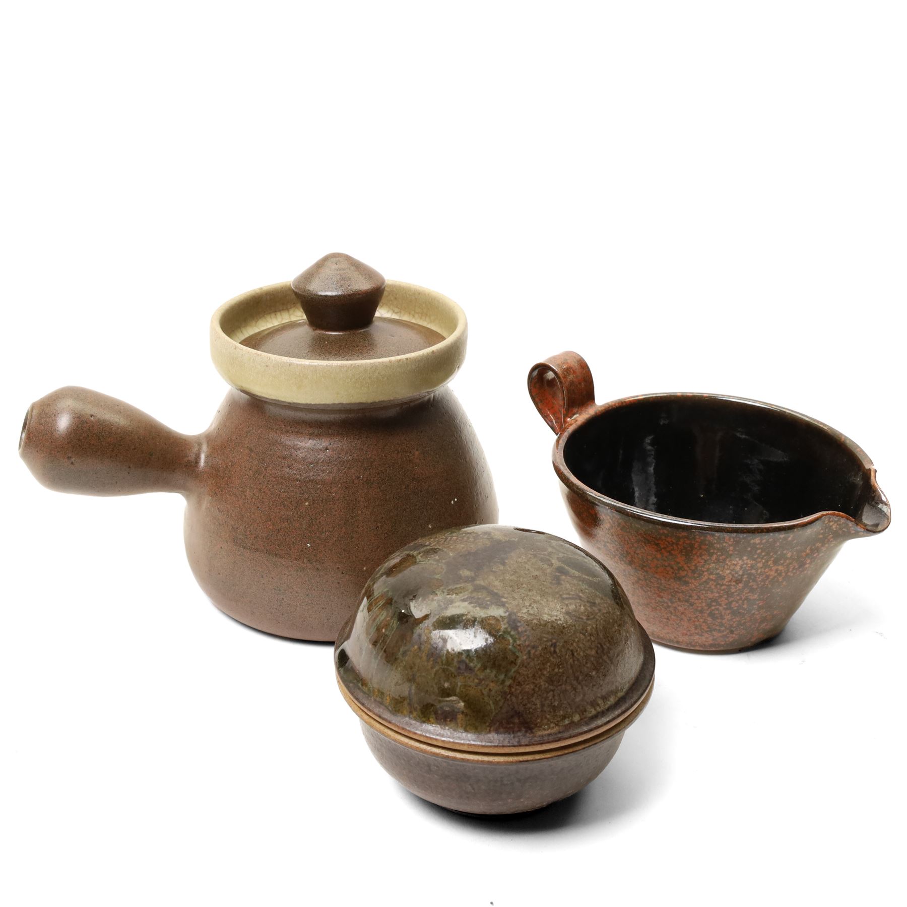 Collection of studio pottery, artists to include David Pritchard, Diana Worthy and others, in mottled brown glazes (10)