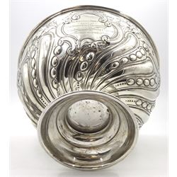 Edwardian silver rose bowl, the part fluted bowl embossed with acanthus leaves, flower heads and C scrolls and personally engraving 'S.S Rievaulx Abbey - Built By - Earle's Shipbuilding & Engineering Co Ltd - For The - Hull & Netherlands Steamship Co. Limited Launched December 23rd 1907', upon a spreading circular foot, hallmarked F Boyton & Co, London 1905, H14.5cm, D20.5cm, approximate weight 17.34 ozt (539.6 grams)
