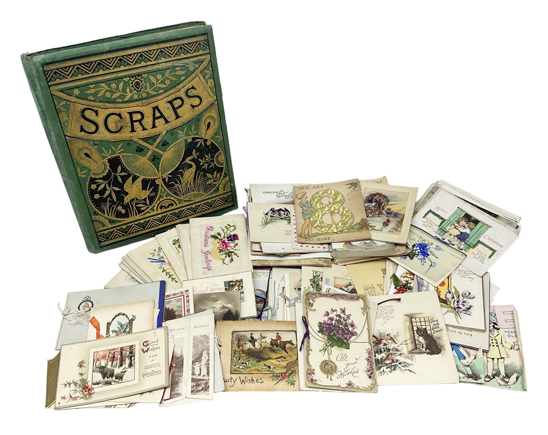 Victorian scrap album, well stocked with greeting cards and scraps; ten WW1 French embroidered silk postcards/greeting card including envelope type with greeting card insets; and large quantity of Edwardian and later postcards and greeting cards including maritime, Bonzo, greeting etc