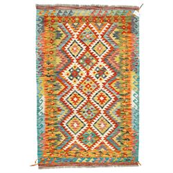 Chobi flatweave kilim, with a repeating stepped diamond medallion design in ivory, rust, t...