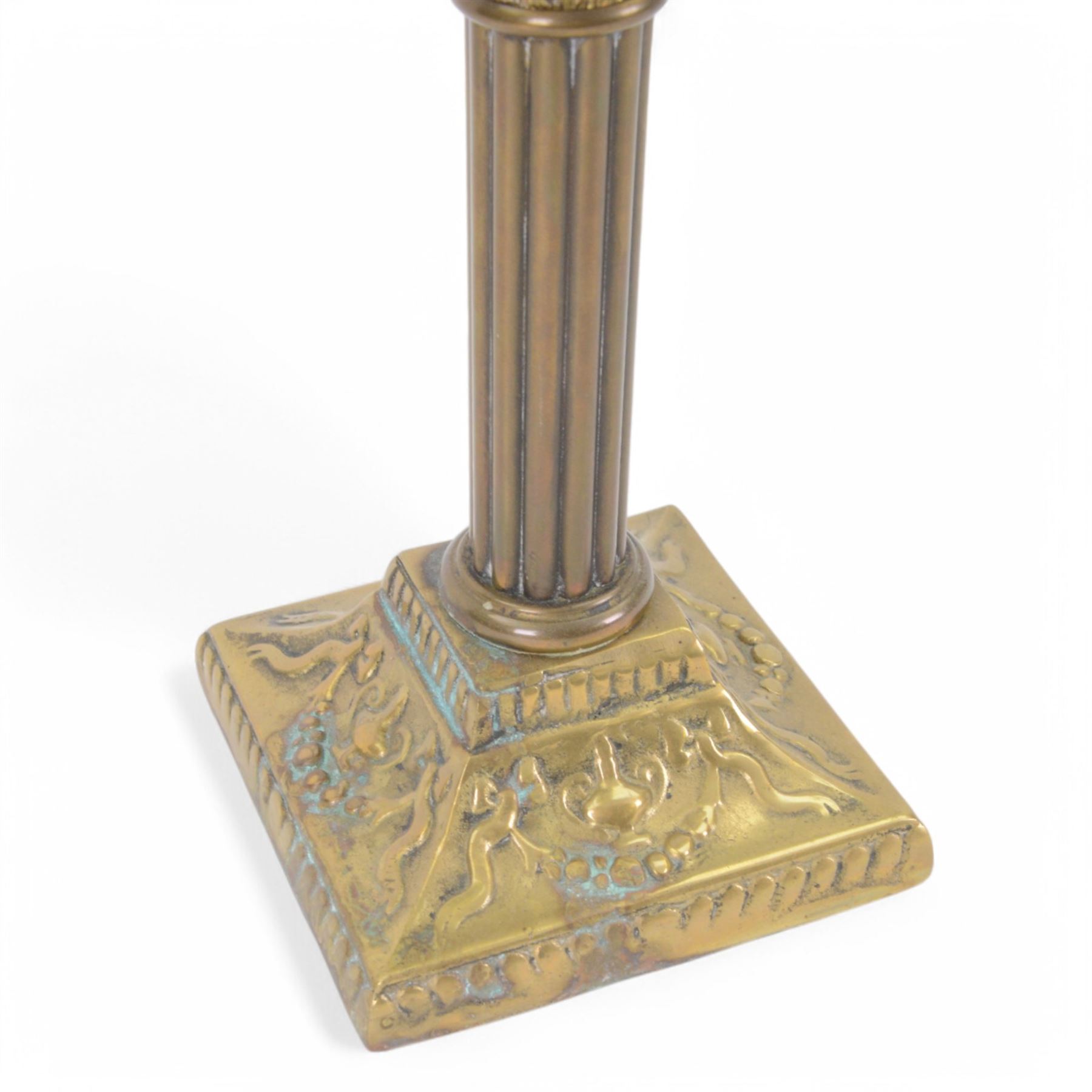 Green glass and brass oil lamps, with frilled glass shade, reservoir decorated with flowers, upon corinthian column with square base, H74cm