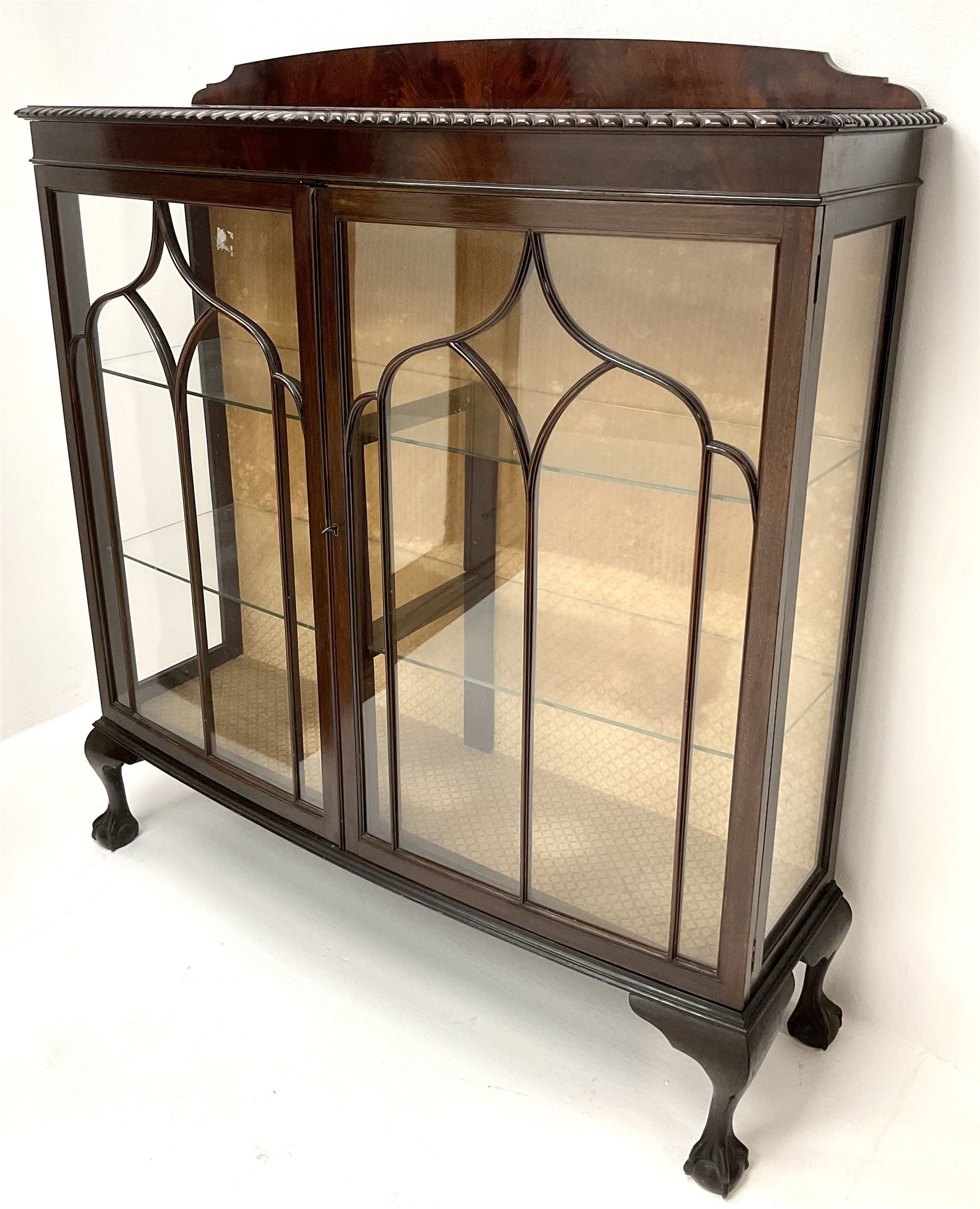 Early 20th century mahogany bow front display raised shaped