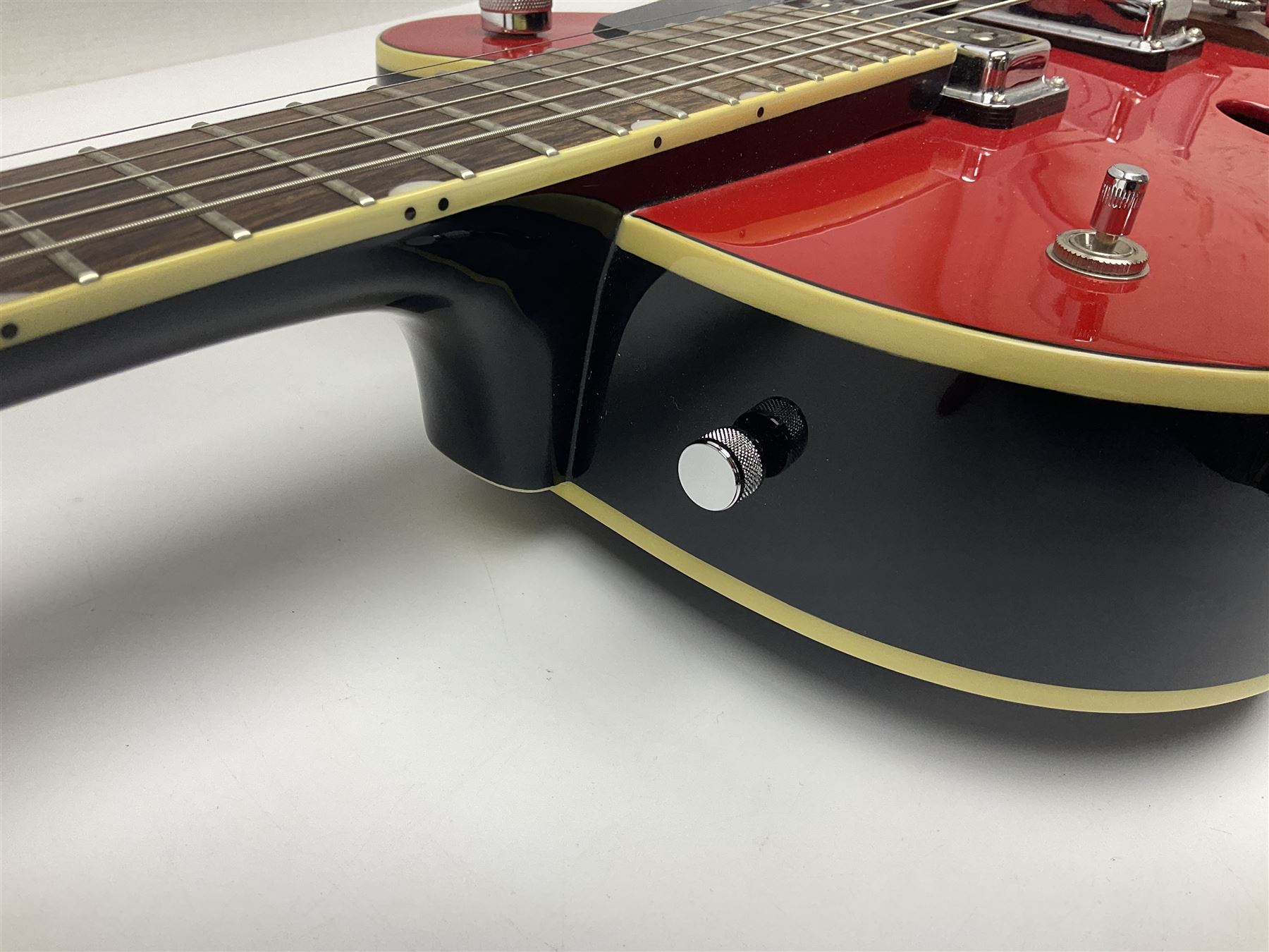 Gretsch Electromatic semi-acoustic guitar model G5129 in black and red with Bigsby tremolo, serial no.KS05063904; L105cm; in fitted hard carrying case