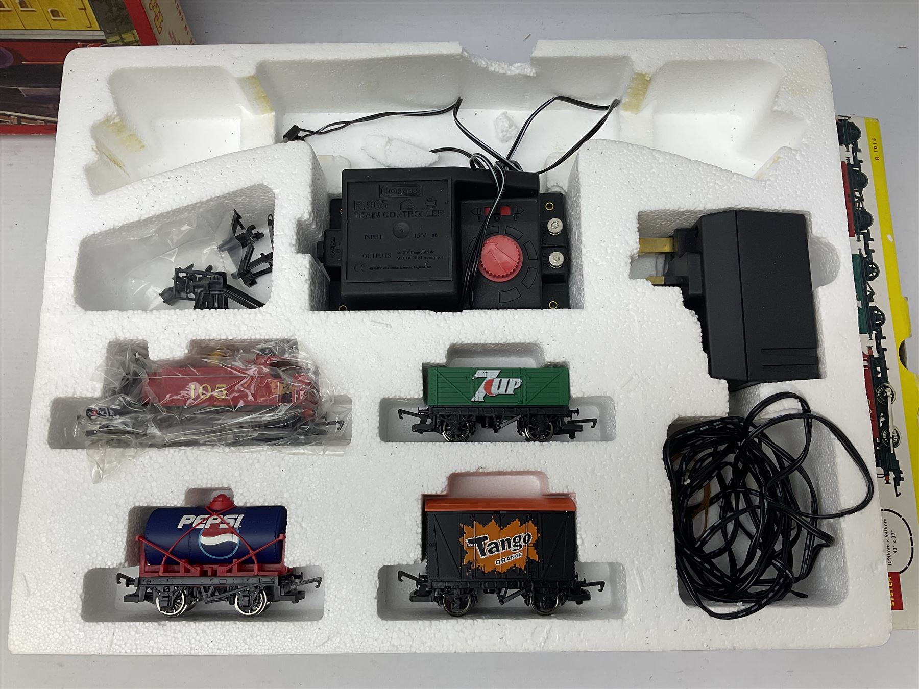 Tri-ang Hornby '00/H0' gauge - RS51 set 'The Freightmaster' with BR Class 31 diesel locomotive No. D5572, in lined green livery and seven freight wagons including box van, open wagon, tank wagon, guard's van, etc. and  quantity of track; boxed with inner packing trays; and Hornby R1015 Industrial Freight Set with 0-4-0 tank locomotive No.105 and three wagons; boxed (2)