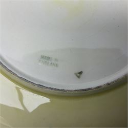 Moorcroft Tiger Lily pattern plate on a yellow ground, with painted and impressed mark beneath, D26cm