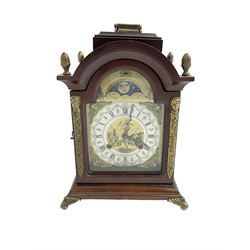 Hermle - 20th century 8-day striking bracket clock, in a break arch mahogany case with carrying handle, brass dial with silvered chapter ring and working moon disc, striking the hours and half hours on two bells, spring driven twin train movement with a floating balance escapement. 