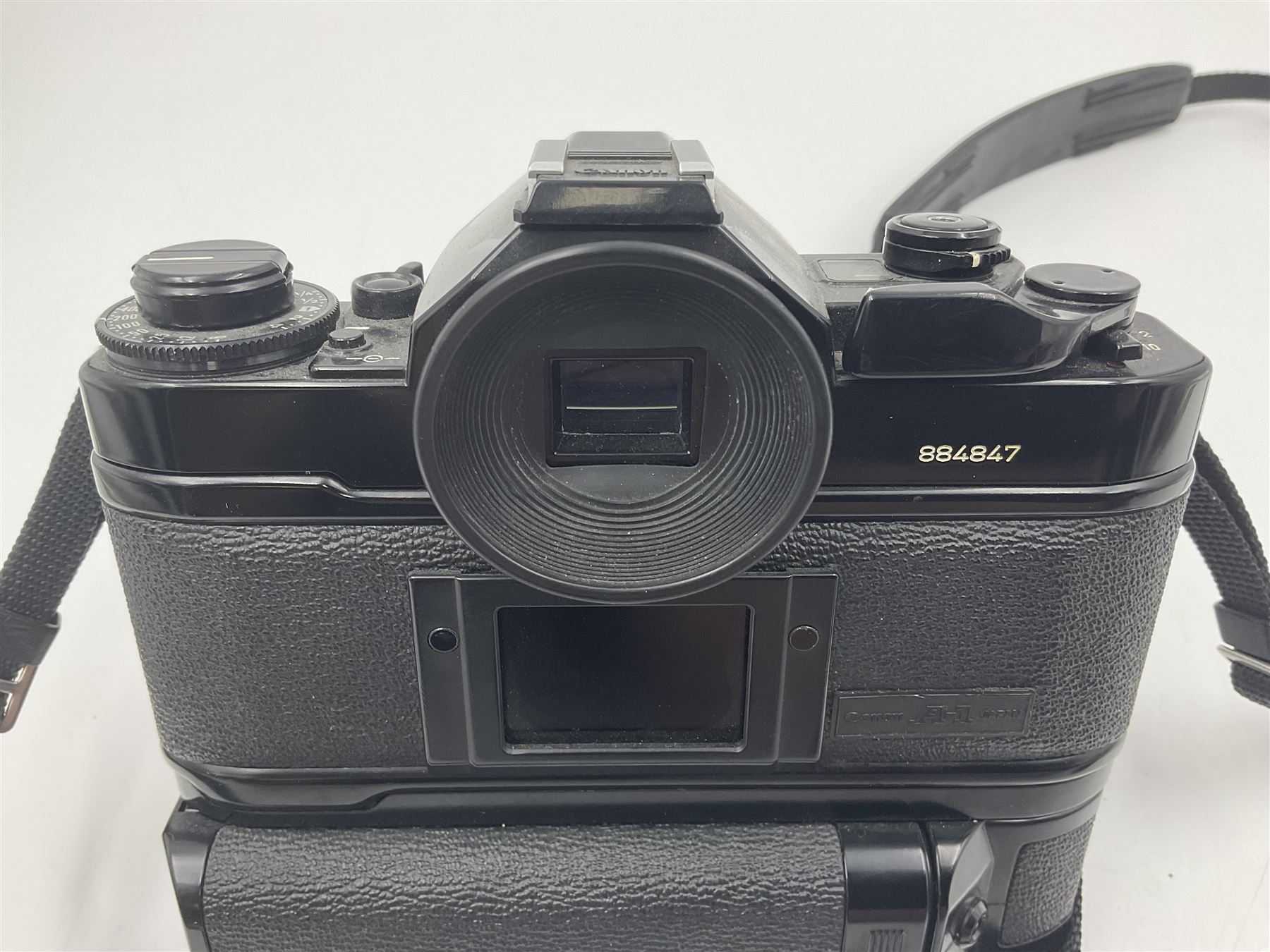 Canon A1 camera body, serial no 884847 with 'Canon FD 55mm 1;1.2 s.s.c' lens serial no 115005