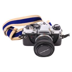 Olympus OM10 SLR camera, lenses including Miranda 28mm 1:2.8 and Miranda 70-210mm 1:4.5-5.6, other accessories, carry case and lens pouches