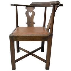 Georgian oak corner elbow chair, heart pierced back splats over tan leather drop-in seat, raised on square supports with inner chamfer joined by X-stretcher