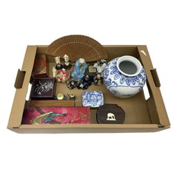 Assorted collectables, to include Oriental blue and white vase, various Oriental ceramic figures, Eastern boxes, hand held fan, etc., in one box 