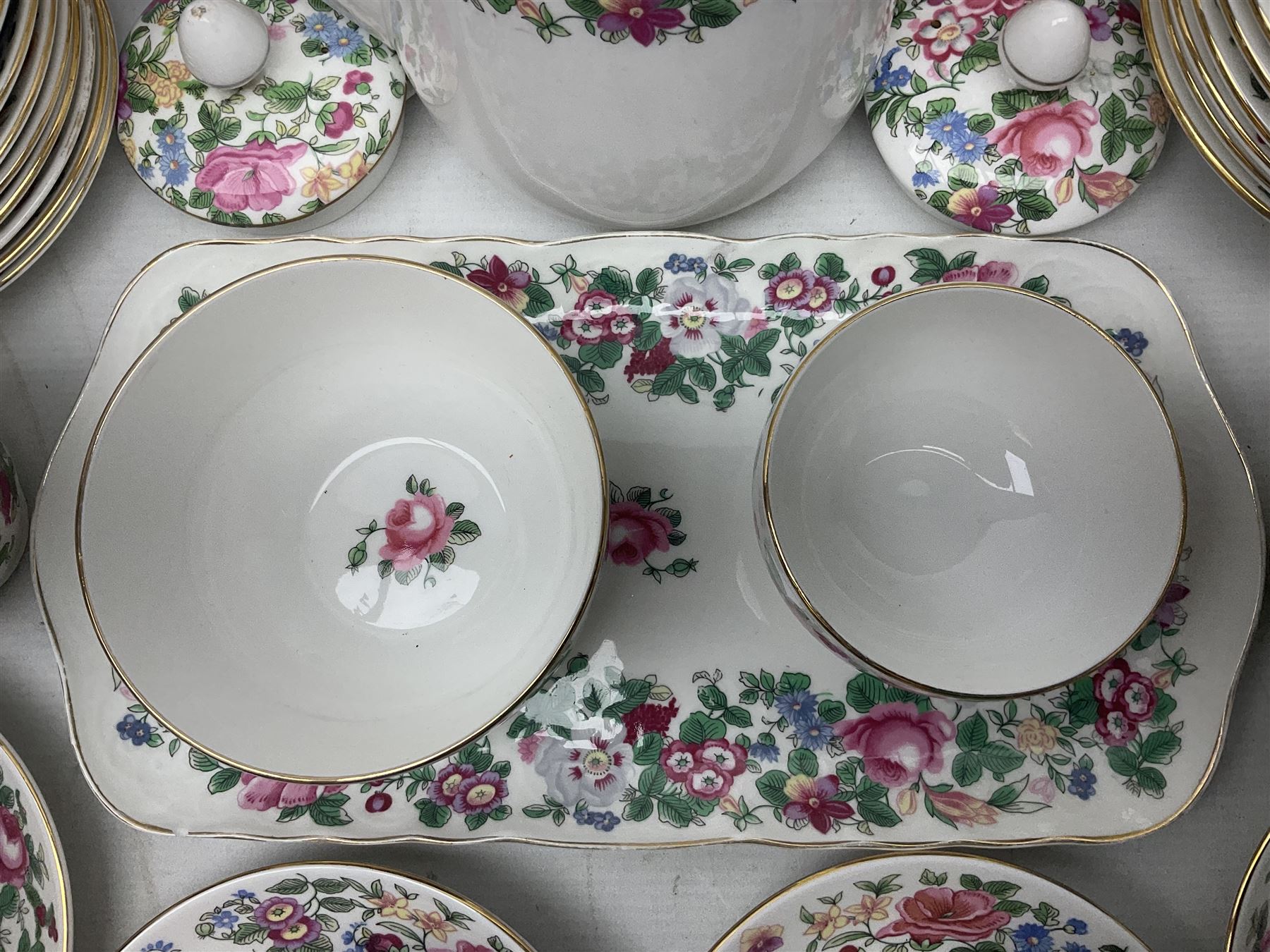 Crown Staffordshire Thousand Flowers pattern part tea service, to include teapot, two open sucriers, eighteen cups, fifteen saucers etc (57)