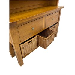 Manor Oak - light oak dresser and rack, fitted with two shelves with three drawers, two deep drawers and pot baked base with basket storage
