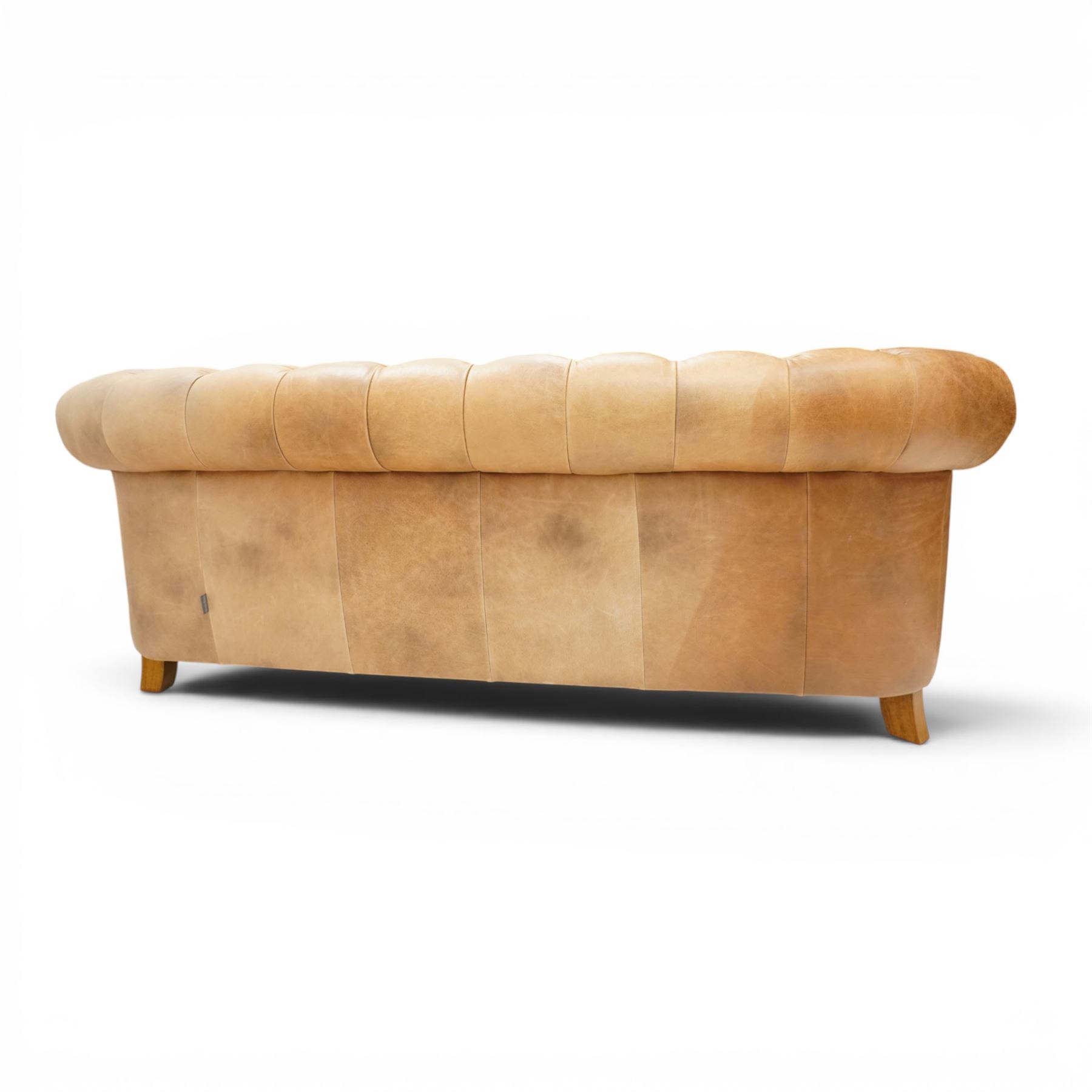 Alexander James - Chesterfield tan three seat sofa, button backed with scrolled arms, brass studded trim raised on light wood turned feet