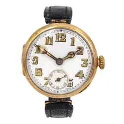 WWI 9ct gold wristwatch, white enamel dial with luminous hands and Arabic hour markers, case by Arthur George Rendell, London import mark 1915, on black leather strap