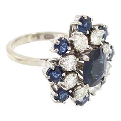 18ct white gold sapphire and diamond cluster ring, single oval cut sapphire of approx 1.85 carat, surrounded by eight round brilliant cut diamonds and eight round cut sapphires, stamped Graff, total sapphire weight approx 3.40 carat, total diamond weight approx 1.35 carat