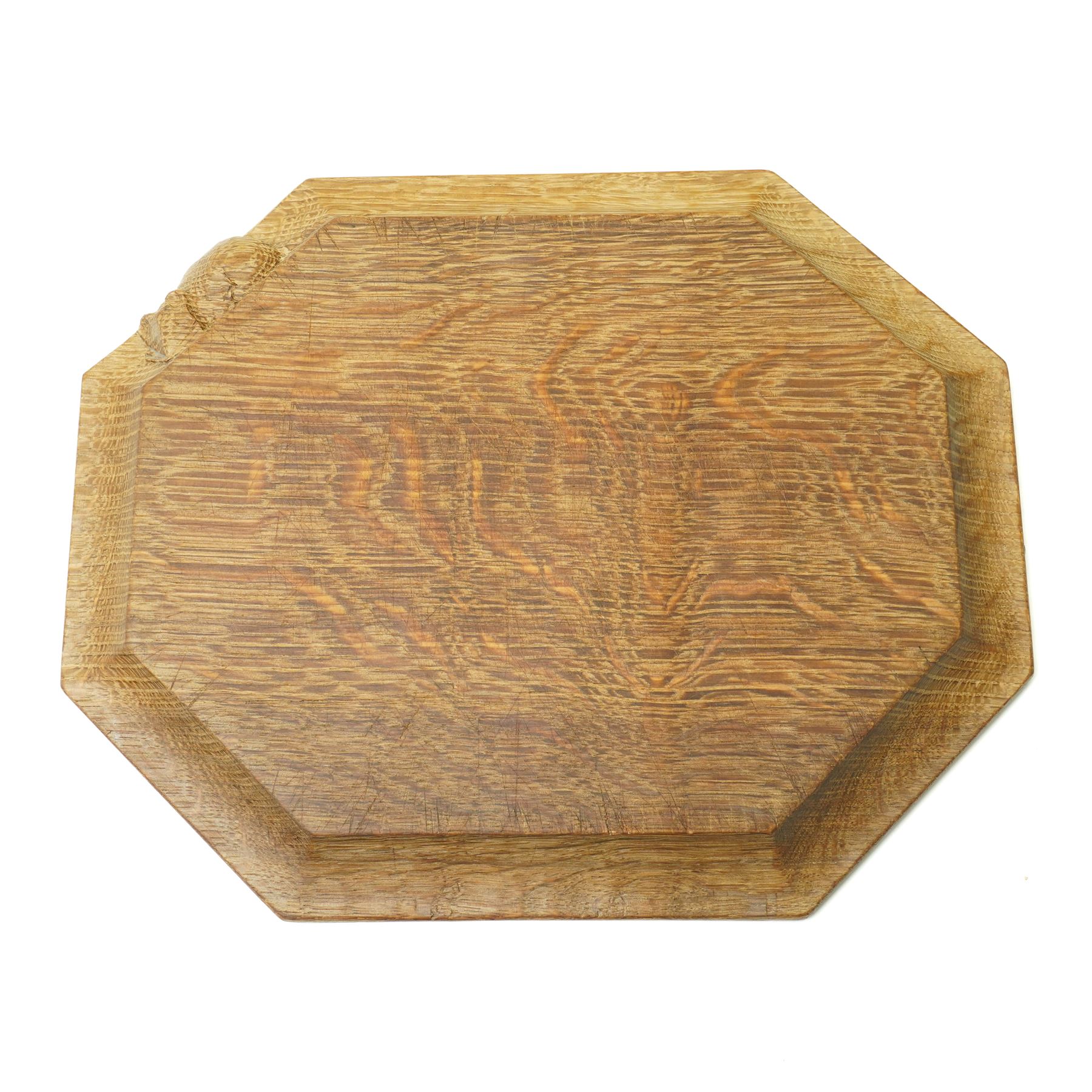 Mouseman - oak chopping board, of canted octagonal form, with carved mouse signature, by the workshop of Robert Thompson of Kilburn