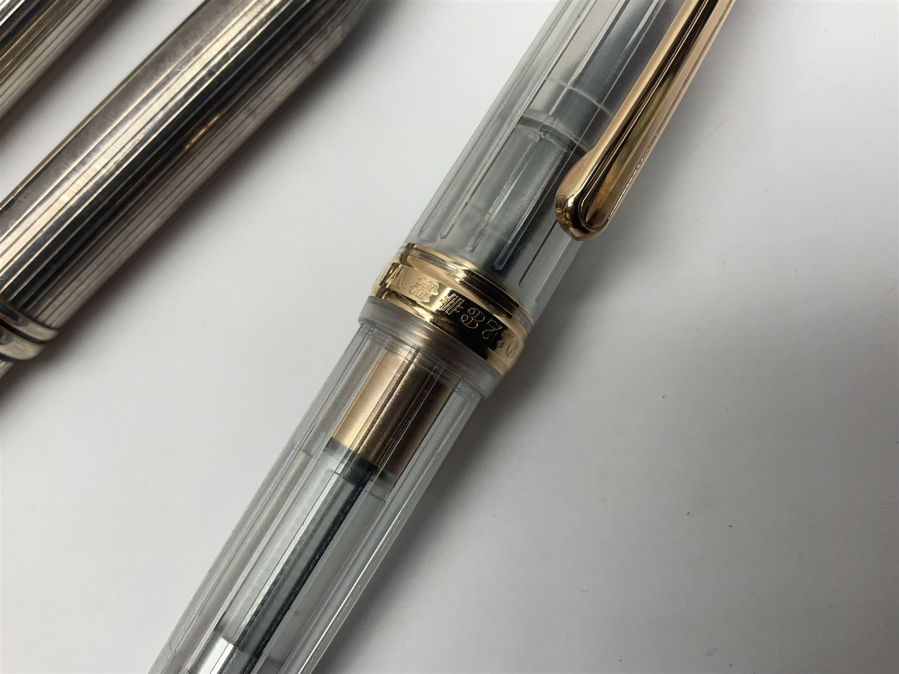 Cross sterling silver fountain pen, having fluted barrel and cap, stamped 