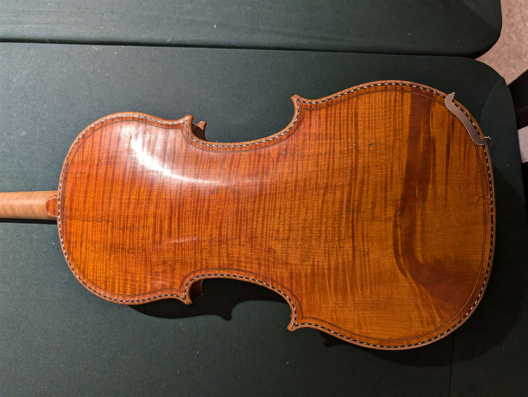 19th century full size European violin, spruce top, figured maple full back and sides, double purfling, in fitted case with two bows.